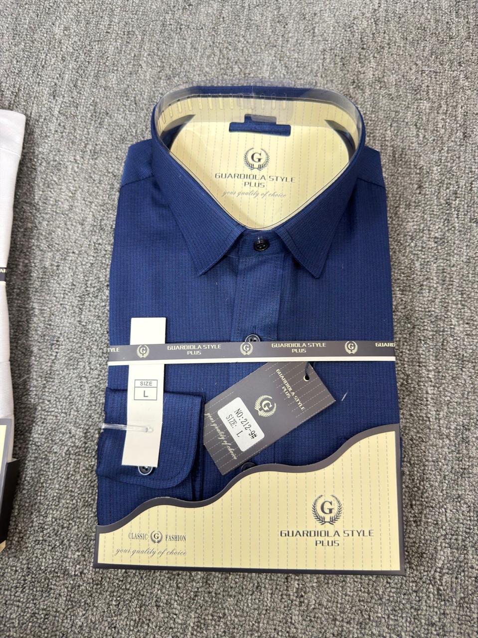 deep blue Guardiola shirt